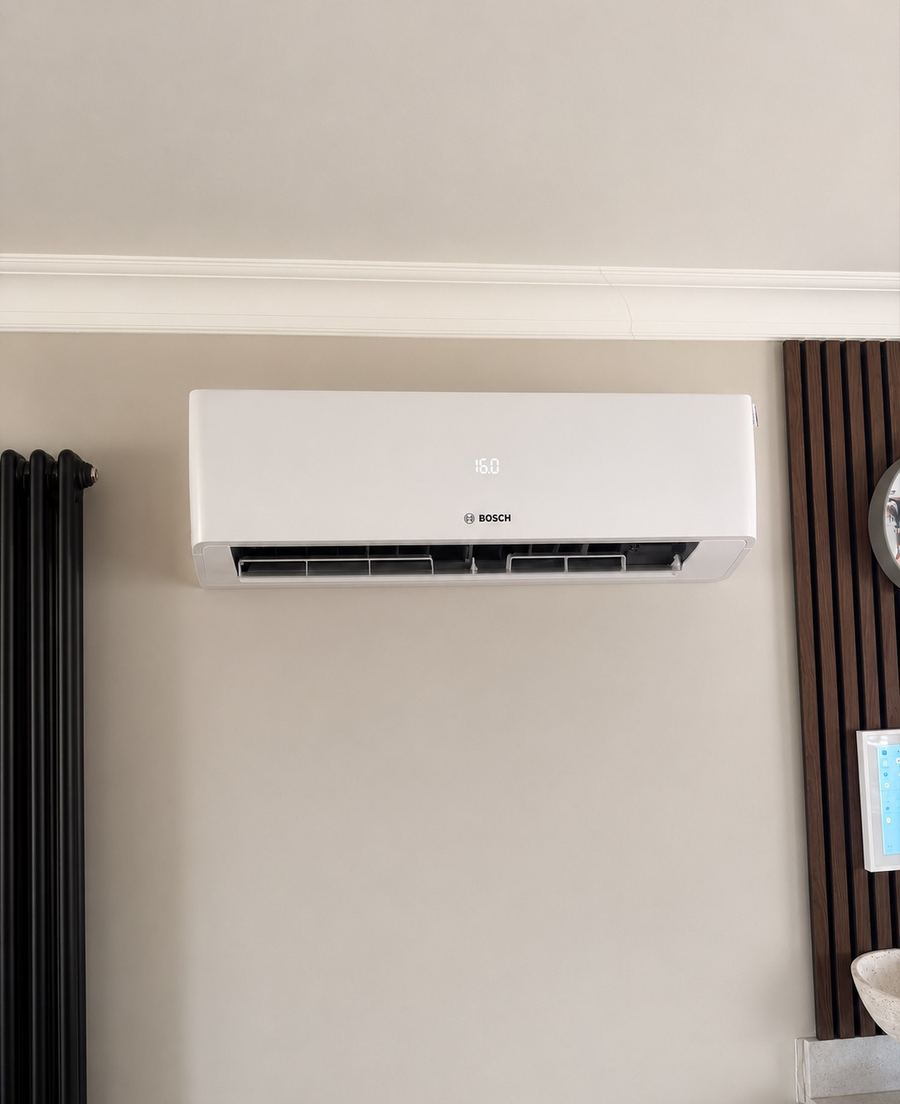 Bosch air conditioning unit fitted on a living room wall by George Ayres
